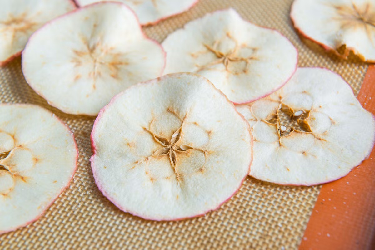 Thinly Sliced Baked Apple Pieces Sprinkled with Granulated Sugar